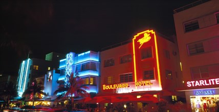 Miami, Florida, USA. South Beach Ocean Drive Art Deco Buildings at night Colony & Boulevard Hotels