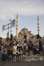 Istanbul, Turkey. Sultanahmet. Meeting place on steps in front of The New Mosque or Yeni Camii from