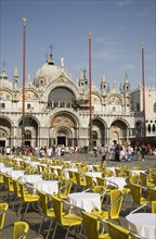 Venice, Veneto, Italy. Centro Storico St. Marks Square Cafe tables prepared for customers in early