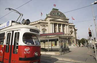 Vienna, Austria. Neubau District. Early model Wiener Linien Tram outside The Volkstheater with