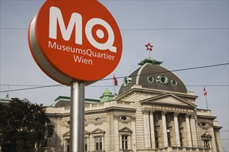 Vienna, Austria. Neubau District. Circular information sign with MQ in white on orange to indicate