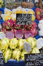 Vienna, Austria. The Naschmarkt. Display of fruit for sale including exotic Dragon Fruit genus