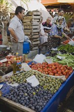 Kusadasi, Aydin Province, Turkey. Stall at weekly market selling fresh fruit and vegetables in