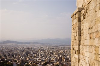 Athens, Attica, Greece. View across city from the Acropolis Propylaea gate to Mount Parnitha to the