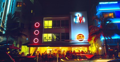Miami, Florida, USA. South Beach Ocean Drive Art Deco Buildings at night Johnny Rockets restaurant