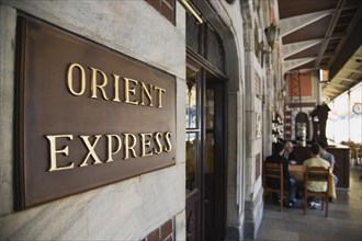 Istanbul, Turkey. Sultanahmet. Orient Express sign beside cafe on station platform. Istanbul