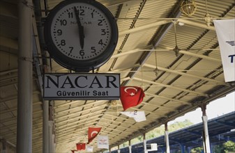 Istanbul, Turkey. Sultanahmet. Station clock on platform giving time of three minutes to six with