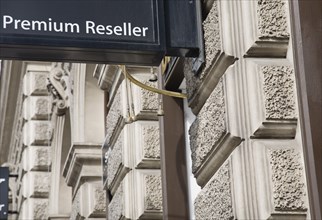 Vienna, Austria. Business sign on building facade reads Premium Reseller. Austria Austrian Republic