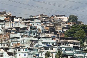 Rio de Janeiro, Brazil. Favela or slum above Centro neighbourhood with pale blue wash houses