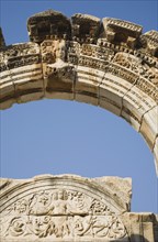 Selcuk, Izmir Province, Turkey. Ephesus. Detail of carved archway and wall relief against clear