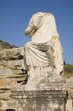 Selcuk, Izmir Province, Turkey. Ephesus. Headless statue on plinth in ancient city of Ephesus on