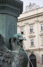 Vienna, Austria. Neubau District. Detail of bronze fountain with swan or goose with outstretched