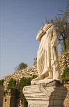 Selcuk, Izmir Province, Turkey. Ephesus. Headless statue on plinth in ancient city of Ephesus on