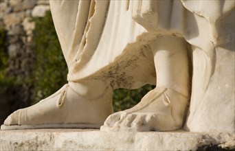 Selcuk, Izmir Province, Turkey. Ephesus. Detail of feet of marble statue in ancient city of Ephesus