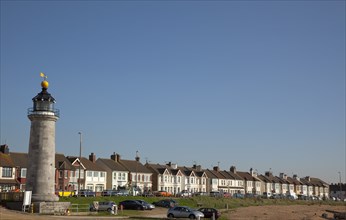 Shoreham-by-Sea, West Sussex, England. Kingston Beach Lighthouse and residential housing along