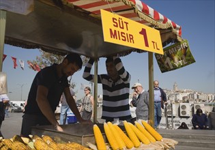Istanbul, Turkey. Sultanahmet. Street stall selling freshly grilled corn on the cob outside The New