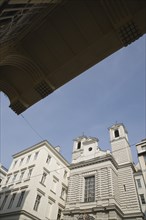 Vienna, Austria. Neubau District. Church exterior viewed from beneath awning of apartment building