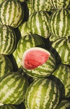 Kusadasi, Aydin Province, Turkey. Fresh watermelon on sale at town produce market with fruit at