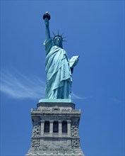 New York, New York State, USA. Statue of Liberty. Close view on plinth torch with gold flame