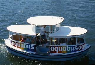 Vancouver, British Columbia, Canada. Tourists on Aquabus tour. American Canadian Destination