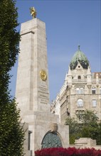 Budapest, Pest County, Hungary. WWII memorial with Art Nouveau building facade behind. Hungary