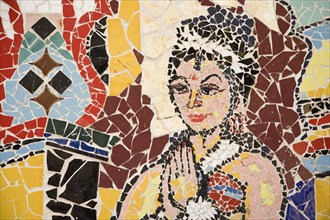 Athens, Attica, Greece. Mosaic of coloured tile pieces depicting female figure at city subway