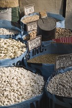Athens, Attica, Greece. Sacks of beans for sale displayed on market food stall. Greece Greek Europe