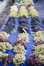 Kusadasi, Aydin Province, Turkey. Grapes for sale on street stall in weekly market stall. Azirince