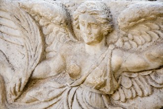 Selcuk, Izmir Province, Turkey. Ephesus. Detail of bas relief carving of the Goddess Nike on column