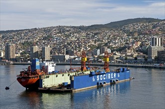 Valparaiso, Chile. Floating dry dock at the once again busy port now a UNESCO World Heritage city.