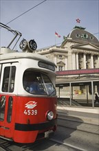 Vienna, Austria. Neubau District. Early model of Wiener Linien tram at the Volkstheater. Austria
