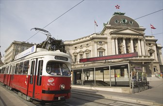 Vienna, Austria. Neubau District. Early model Wiener Linien Tram outside The Volkstheater with