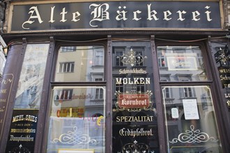 Vienna, Austria. Part view of exterior facade of restaurant with traditional signage. Austria