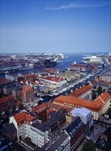Denmark, Copenhagen, View north over city rooftops and harbour from the tower of the Church of Our