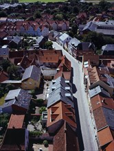 Denmark, Jutland, Ribe, View south-west over city rooftops and cobbled street from the twelth
