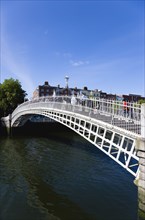 Ireland, County Dublin, Dublin City, The 1816 cast iron Ha Penny or Half Penny Bridge across the