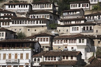 Albania, Berat, Traditional Ottoman buildings on hillside in old town.