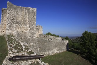 Albania, Berat, Ancient castle battlements with cannon on the walls.
