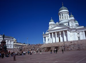 Finland, Helsinki, Senate Square and Lutheran Cathedral.  White exterior facade in neo-classical