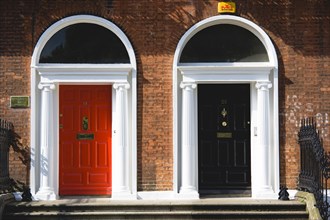 Ireland, County Dublin, Dublin City, Red and black Georgian doors in the city centre south of the