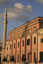 Albania, Tirane, Tirana, Government building facades and minaret of Ethem Bey Mosque in Skanderbeg