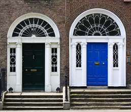Ireland, County Dublin, Dublin City, Green and blue Georgian doors in the city centre south of the