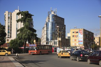Albania, Tirane, Tirana, Busy street scene with bus in traffc.