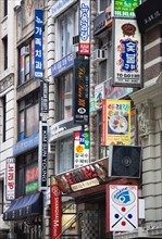 USA, New York, New York City, Manhattan  Korean signs for restaurants and shops on buildings in