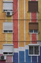 Albania, Tirane, Tirana, Detail of exterior facade of striped  multi-coloured apartment block with