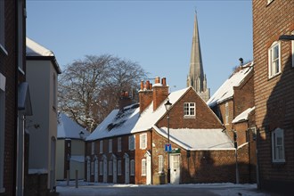 Weather, Winter, Snow, England  West Sussex  Chichester  street scene and the Cathedral in snow.