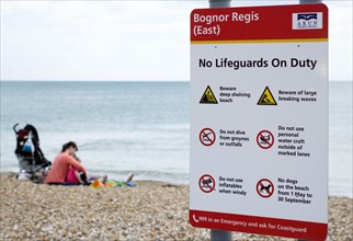 England, West Sussex, Bognor Regis, Sign on the beach warning that No Lifeguards ar On Duty and