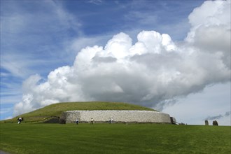 Ireland, Meath, Newgrange, Exterior view of the historical burial site that dates from 3200BC with