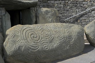 Ireland, Meath, Newgrange, Carved kerb stone outside the entrance to the historical burial site