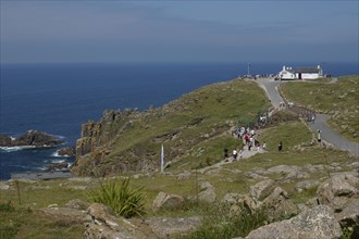 England, Cornwall, Lands End, View over the most western point of mainland Britain with visitors
